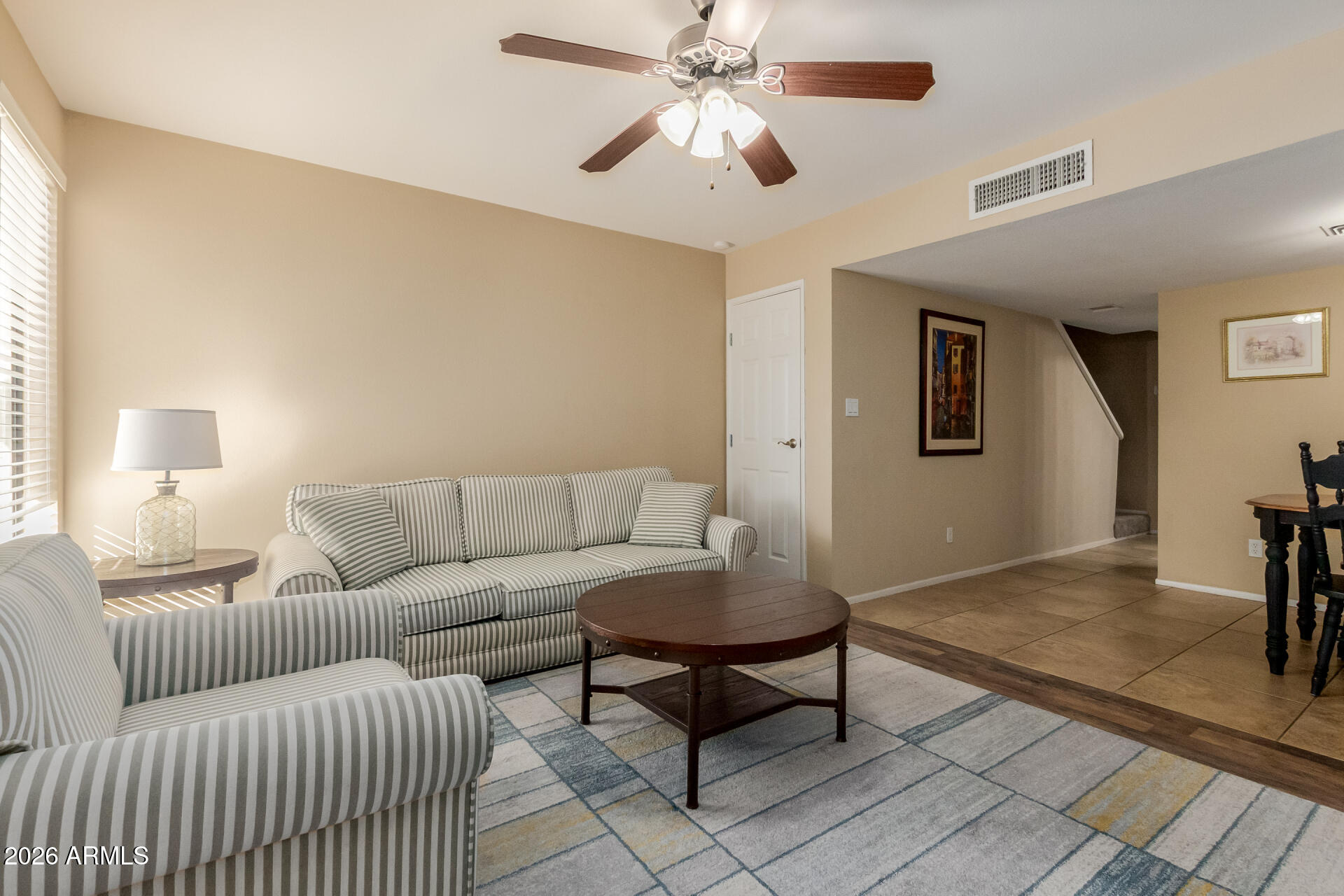 885 North Granite Reef Road, Unit 82 Scottsdale, AZ 85257 - Photo 6 of 32 a living room with furniture and a rug