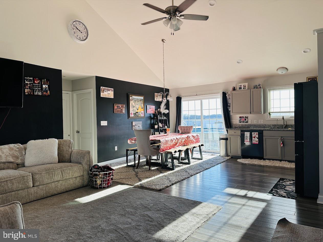 7082 Cannon Road Bridgeville, DE 19933 - Photo 11 of 67 a living room with furniture and kitchen view