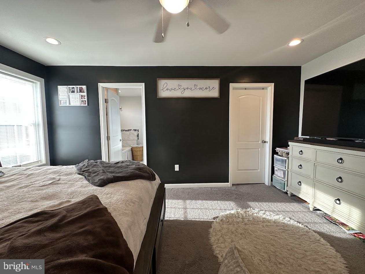 7082 Cannon Road Bridgeville, DE 19933 - Photo 65 of 67 a bedroom with a bed and a flat screen tv