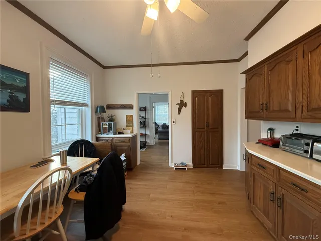 a bedroom with furniture and a window