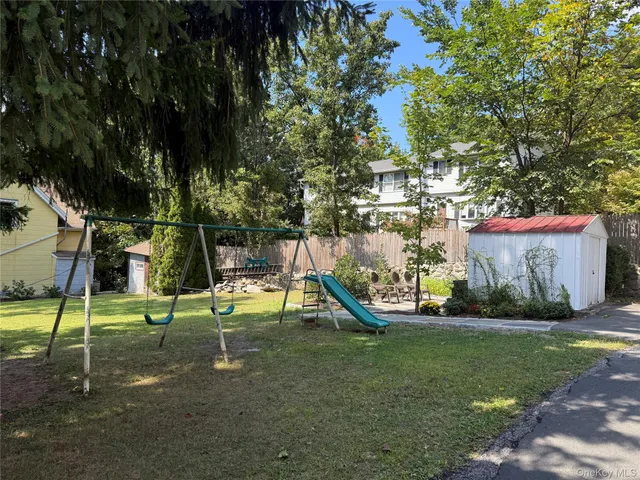 a view of a park with swings