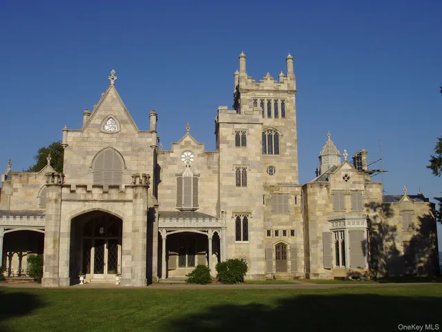 a large building with a clock on the top of it