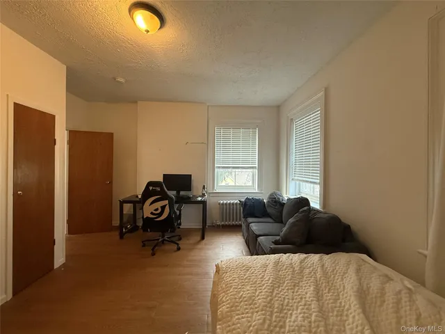 a bed room with a bed and a couch