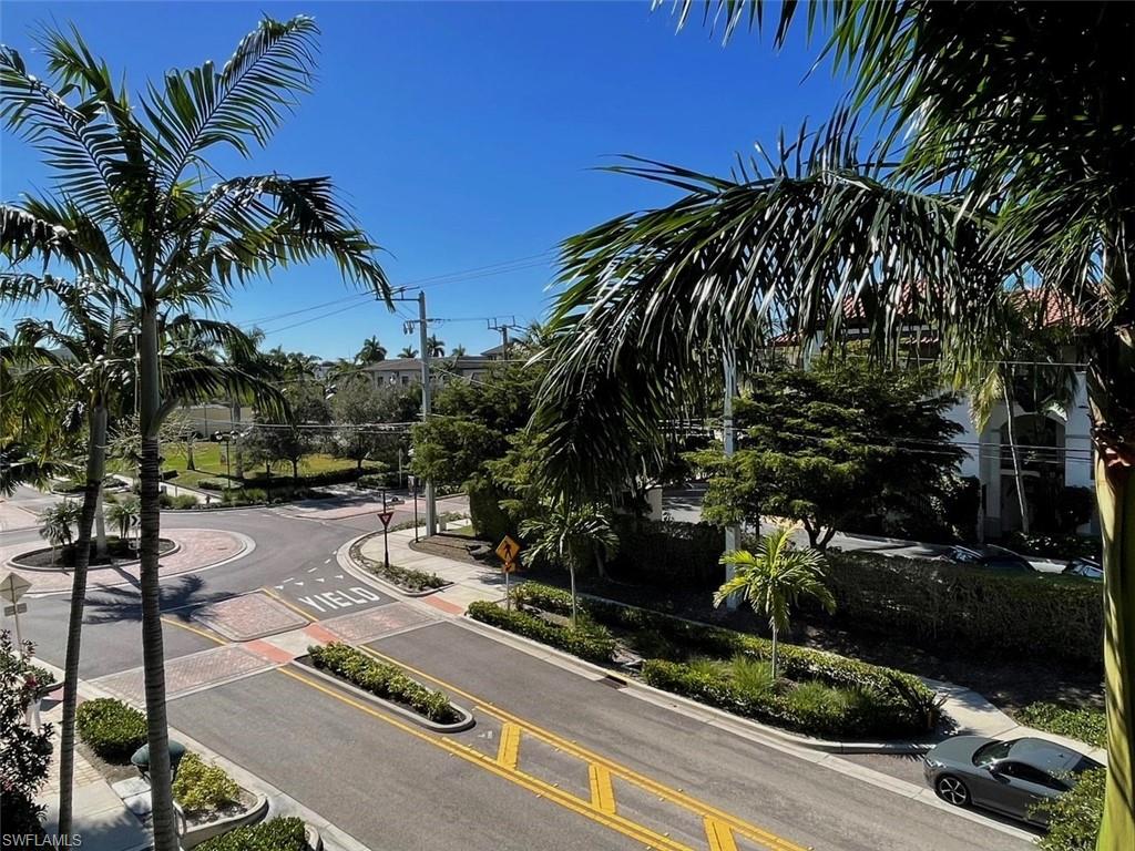 1035 3rd Avenue South, Unit 303 Naples, FL 34102 - Photo 21 of 26 a view of street with sitting area