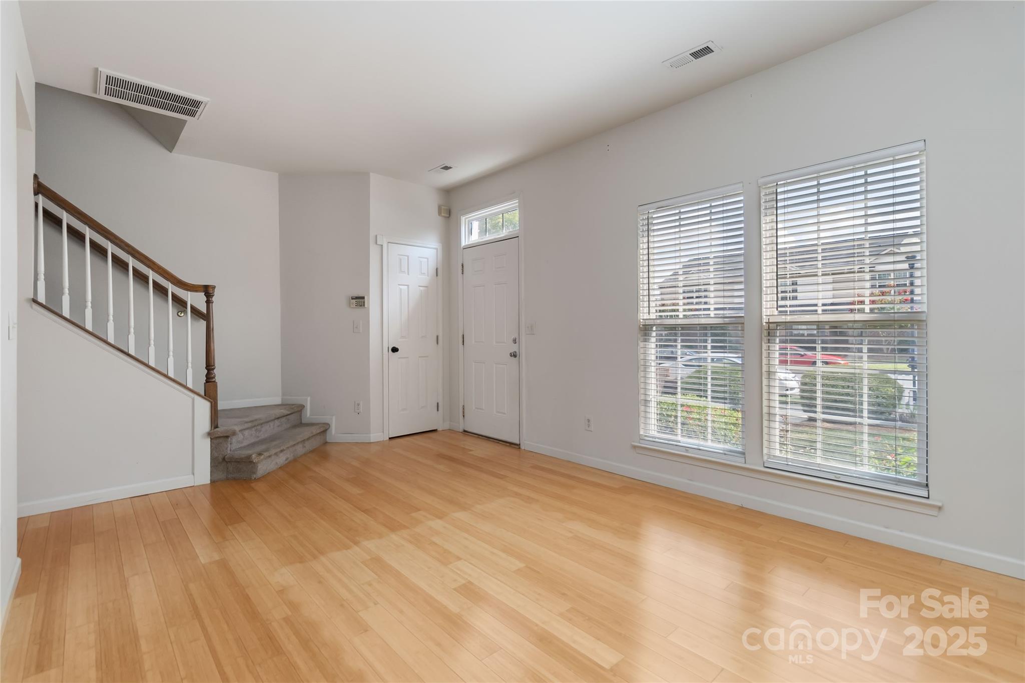 6825 Creft Circle, Unit 49 Indian Trail, NC 28079 - Photo 2 of 21 a view of an empty room with a window