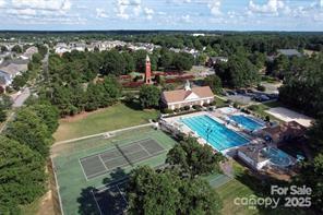 6825 Creft Circle, Unit 49 Indian Trail, NC 28079 - Photo 21 of 21 an aerial view of a house with a yard