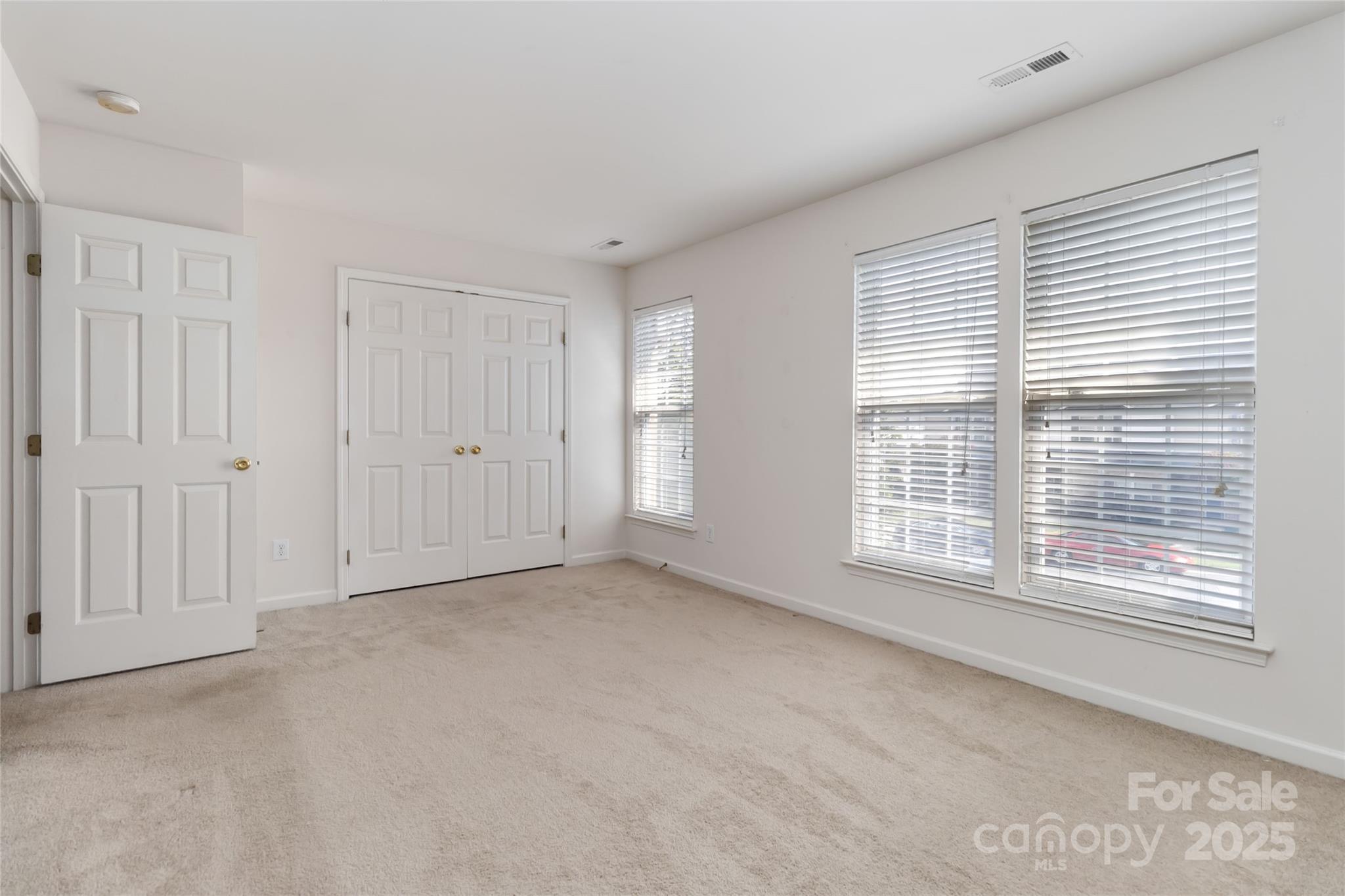 6825 Creft Circle, Unit 49 Indian Trail, NC 28079 - Photo 9 of 21 a view of an empty room with a window