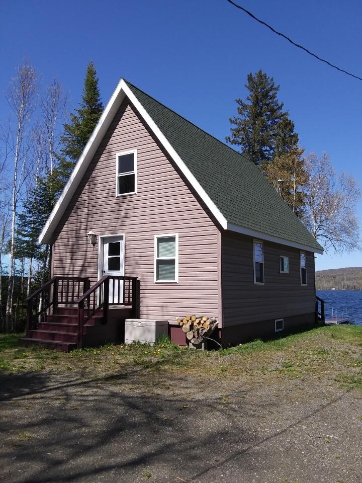 234 W Road Portage Lake, ME 04768 - Photo 2 of 27 road side