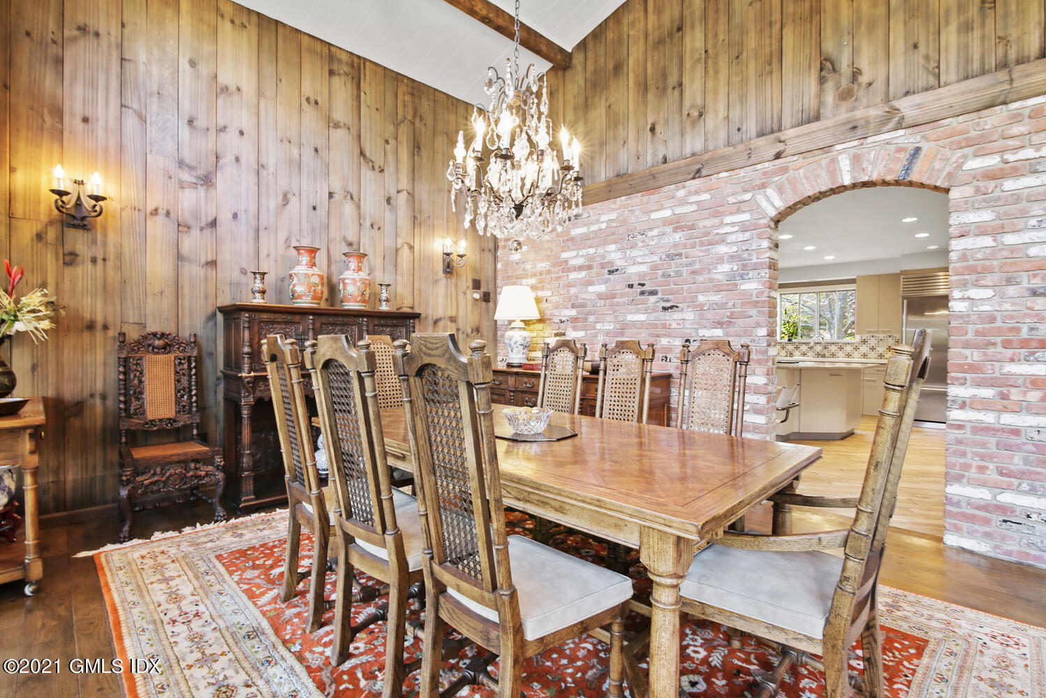 387 Stanwich Road Greenwich, CT 06830 - Photo 12 of 50 a dining room with furniture and wooden floor