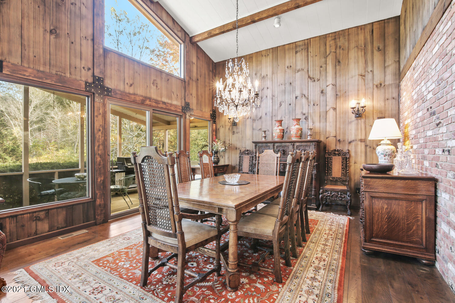 387 Stanwich Road Greenwich, CT 06830 - Photo 13 of 50 a view of a dining room with furniture window and wooden floor