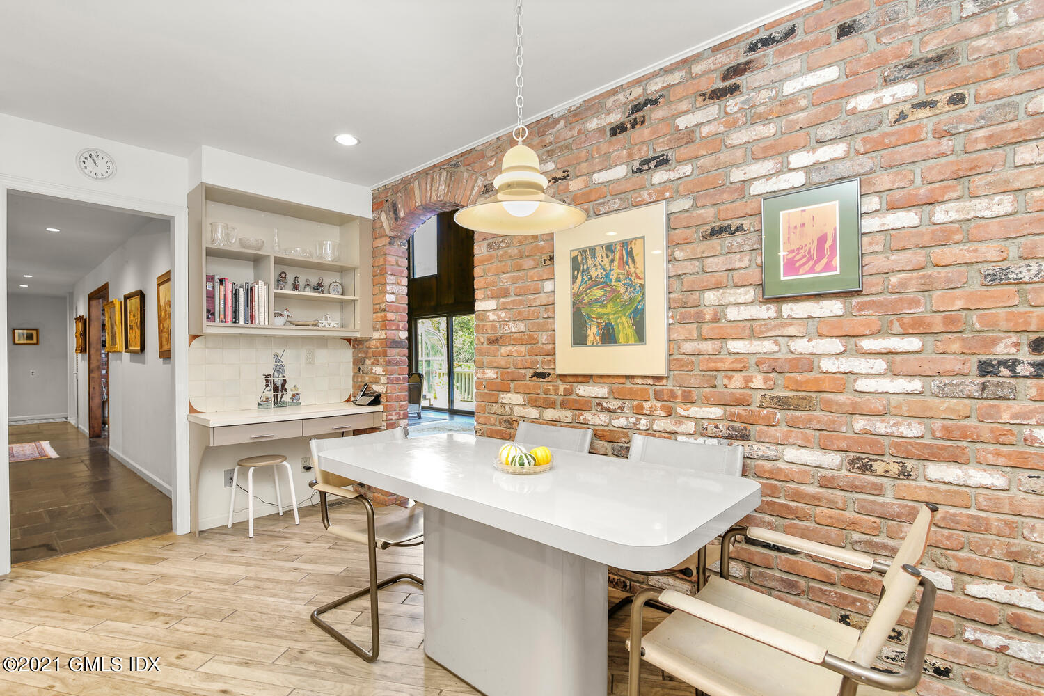 387 Stanwich Road Greenwich, CT 06830 - Photo 17 of 50 a view of a kitchen with a table and chairs