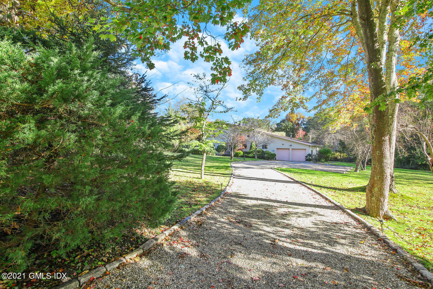 387 Stanwich Road Greenwich, CT 06830 - Photo 2 of 50 a view of a park with large trees