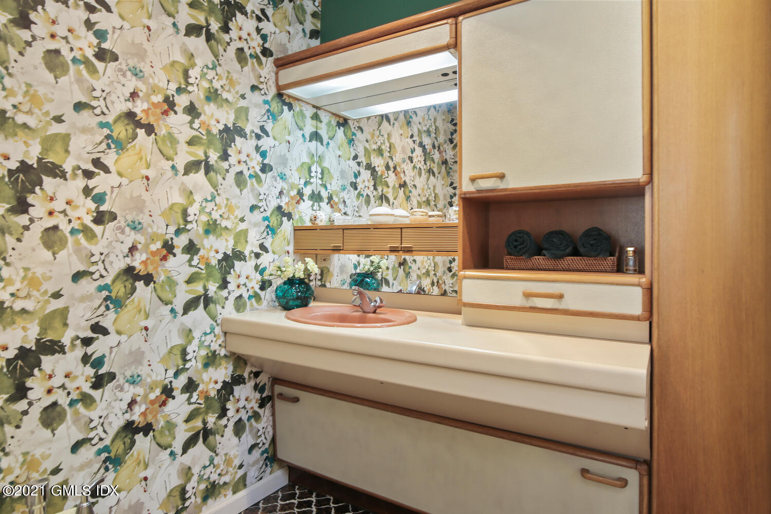 387 Stanwich Road Greenwich, CT 06830 - Photo 24 of 50 a room with a sink and a mirror