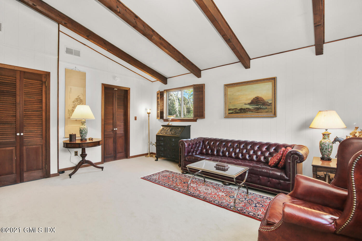 387 Stanwich Road Greenwich, CT 06830 - Photo 27 of 50 a living room with furniture and a window