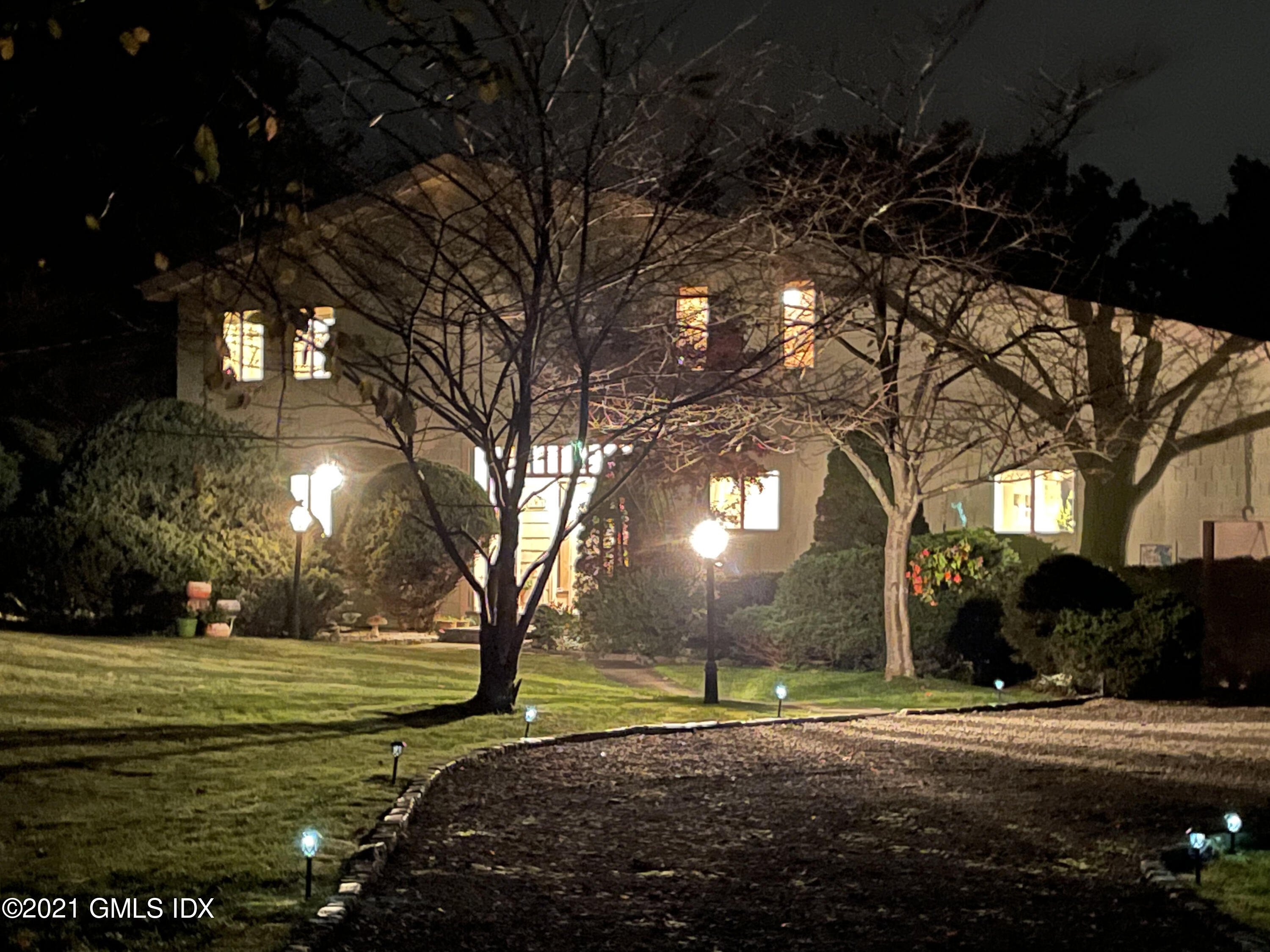 387 Stanwich Road Greenwich, CT 06830 - Photo 3 of 50 a view of a yard