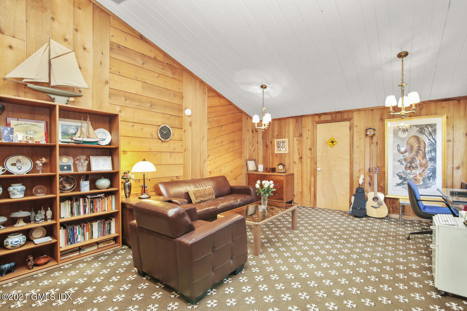 387 Stanwich Road Greenwich, CT 06830 - Photo 31 of 50 a living room with furniture a bookshelf and a large window