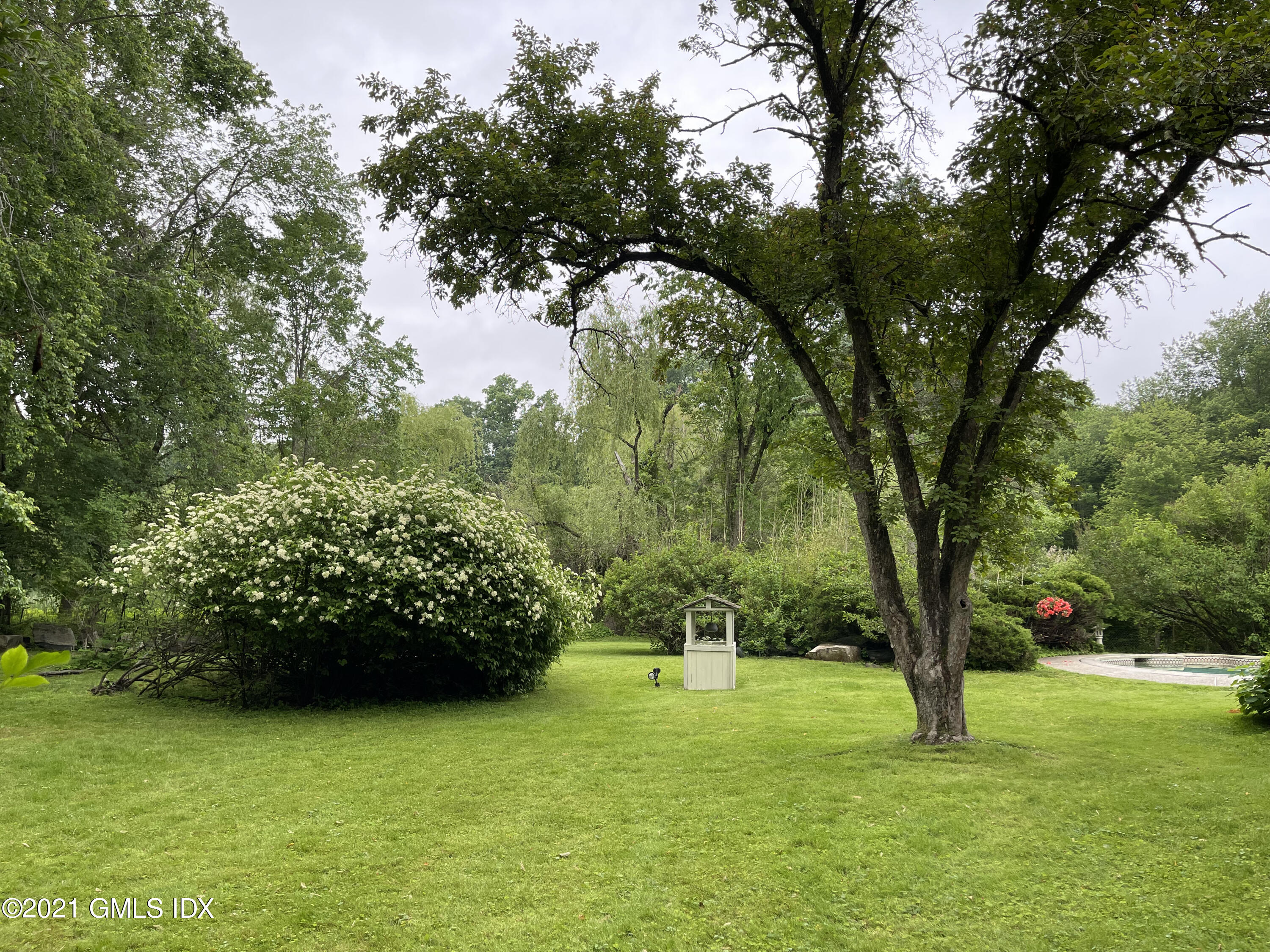 387 Stanwich Road Greenwich, CT 06830 - Photo 37 of 50 a view of field with trees in the background
