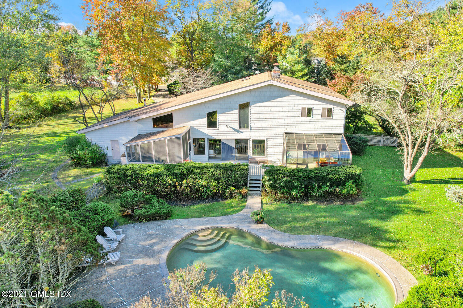 387 Stanwich Road Greenwich, CT 06830 - Photo 5 of 50 a view of a house with a yard