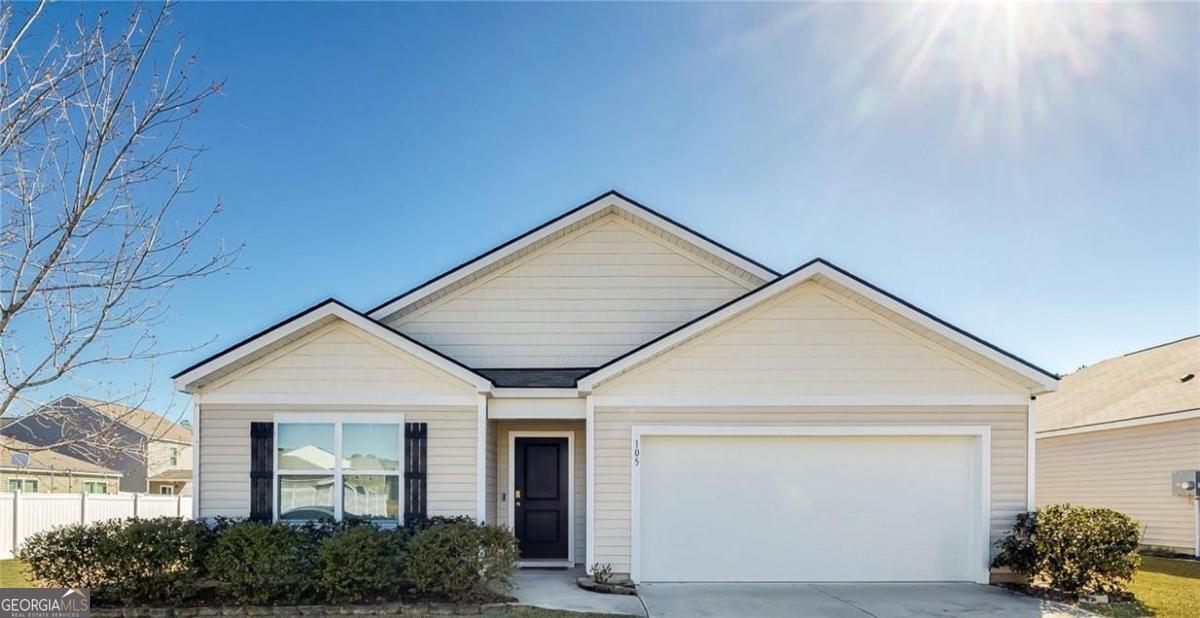 a view of small white house