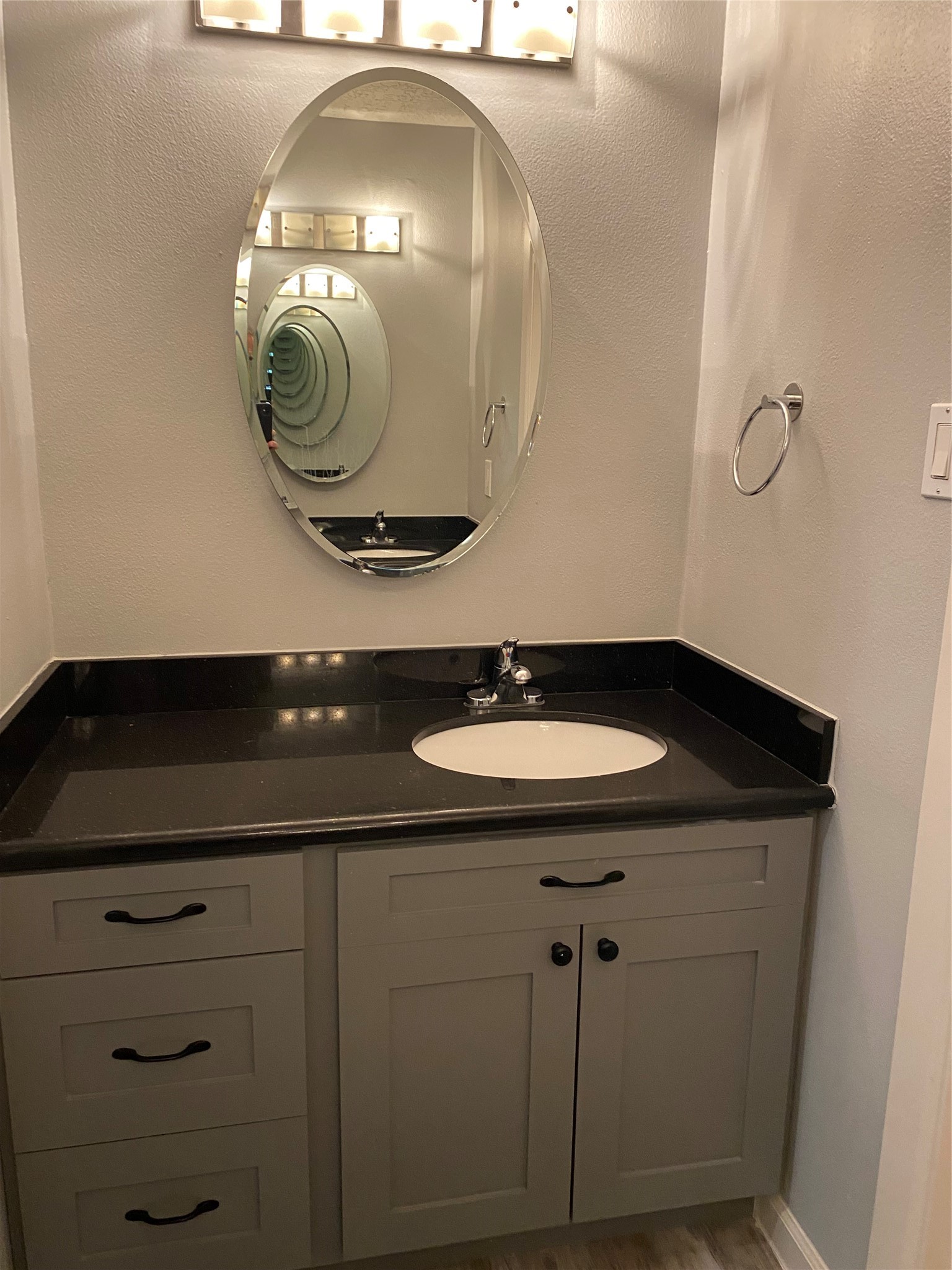 9614 Greenwillow Street Houston, TX 77096 - Photo 22 of 34 closeup of a sink with granite countertop a sink and a mirror