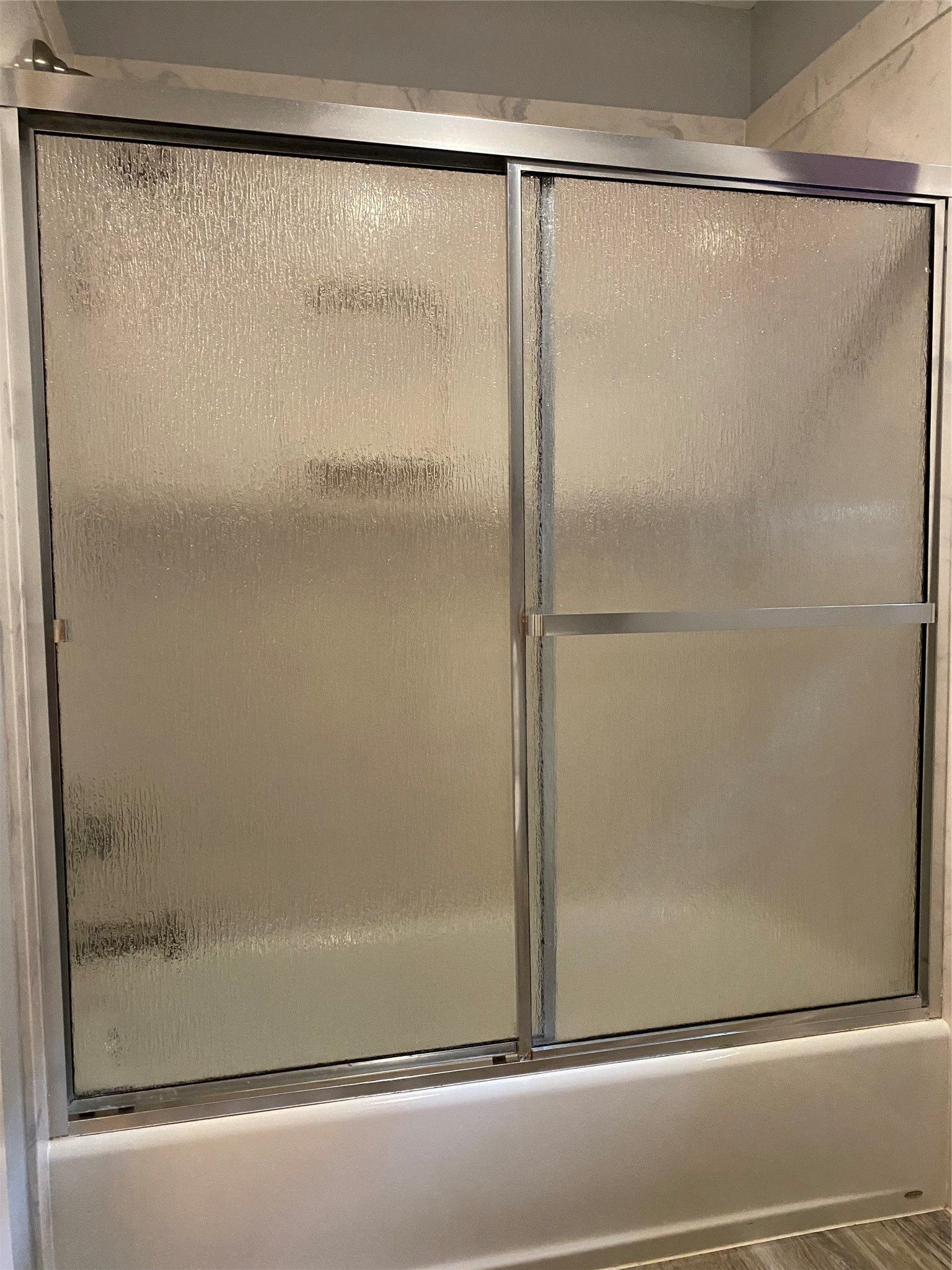 9614 Greenwillow Street Houston, TX 77096 - Photo 23 of 34 a bathroom with a glass shower