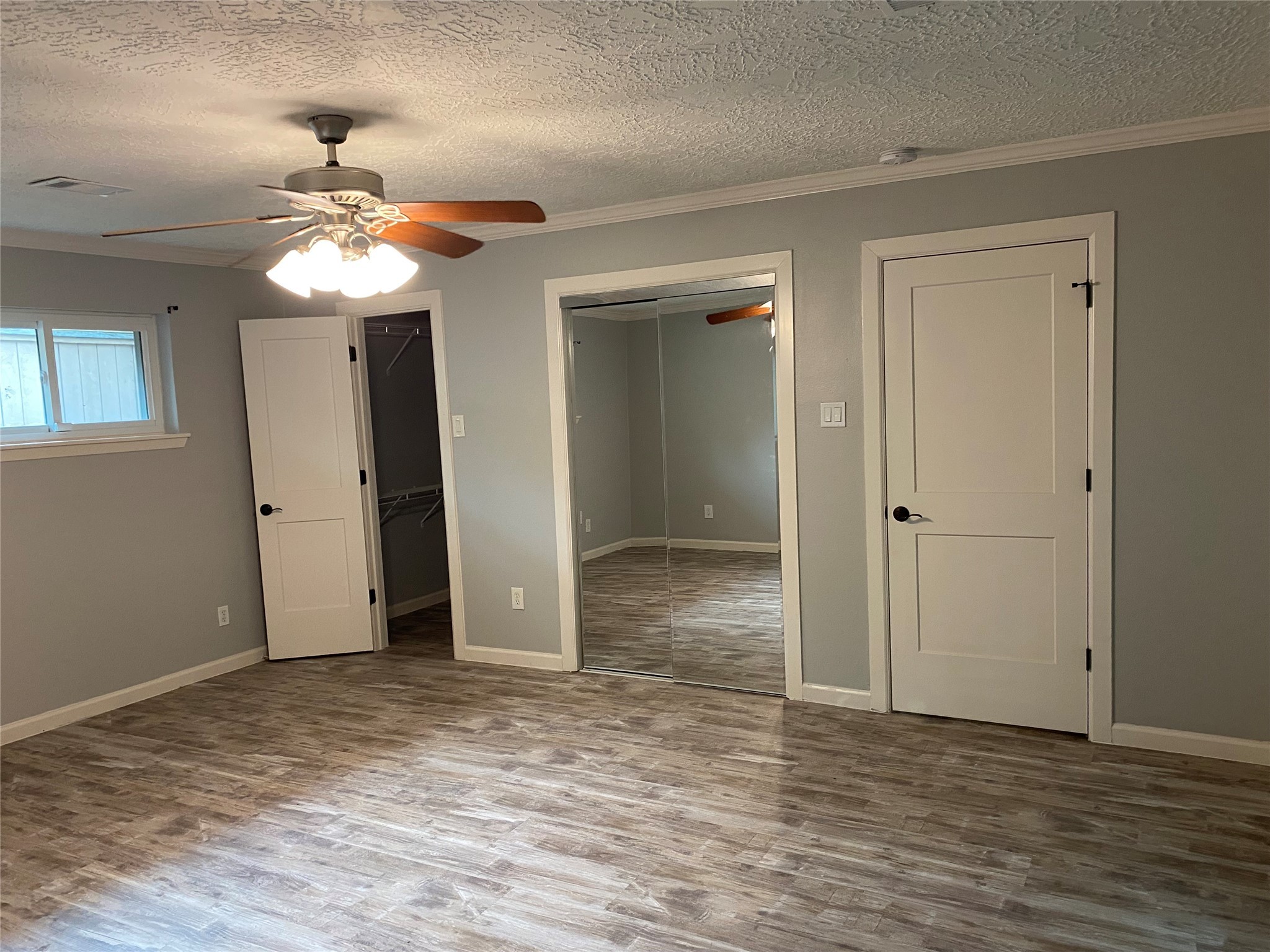 9614 Greenwillow Street Houston, TX 77096 - Photo 25 of 34 a view of a chandelier in big room and chandelier fan