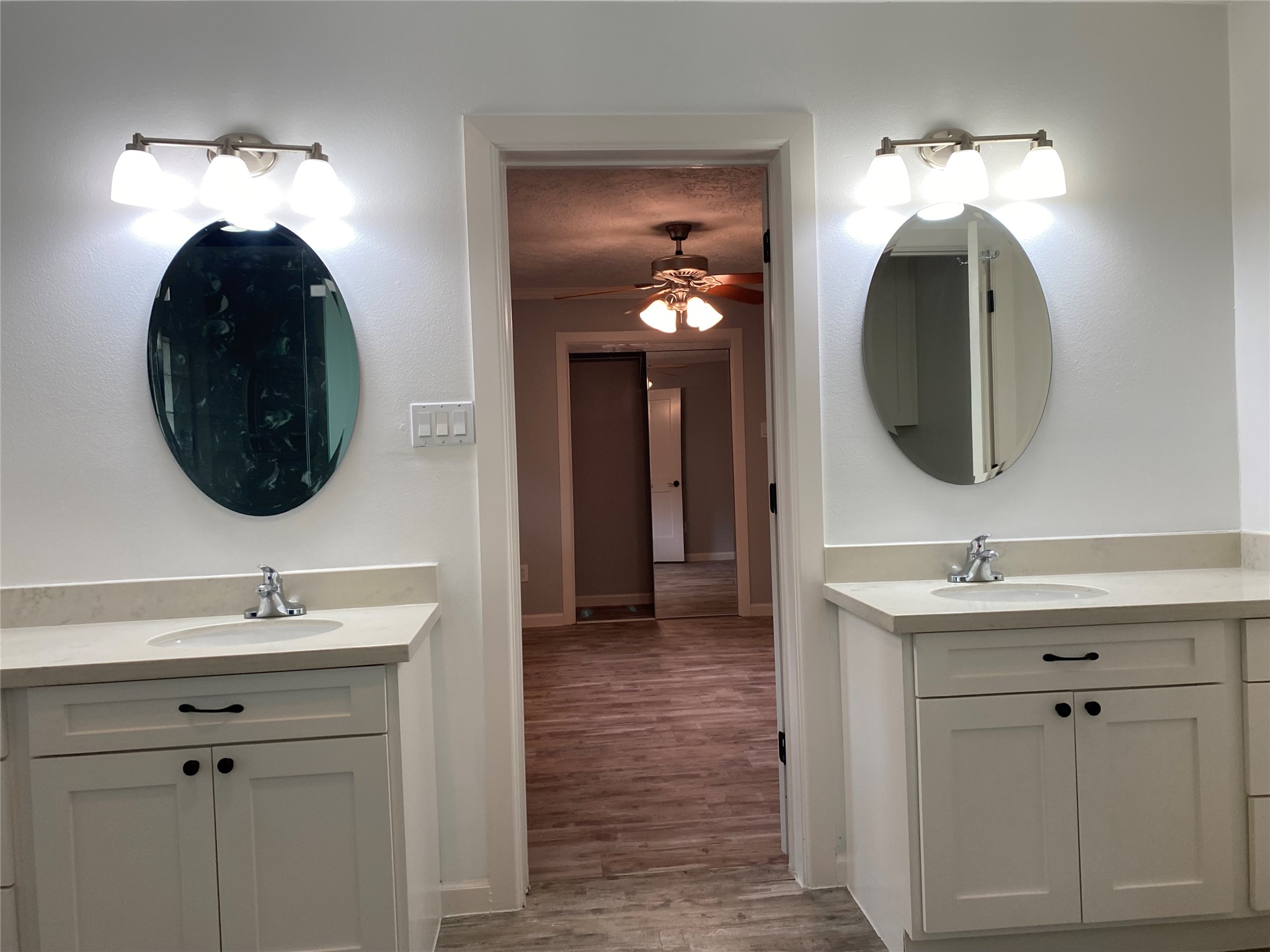 9614 Greenwillow Street Houston, TX 77096 - Photo 27 of 34 a bathroom with a sink and a mirror