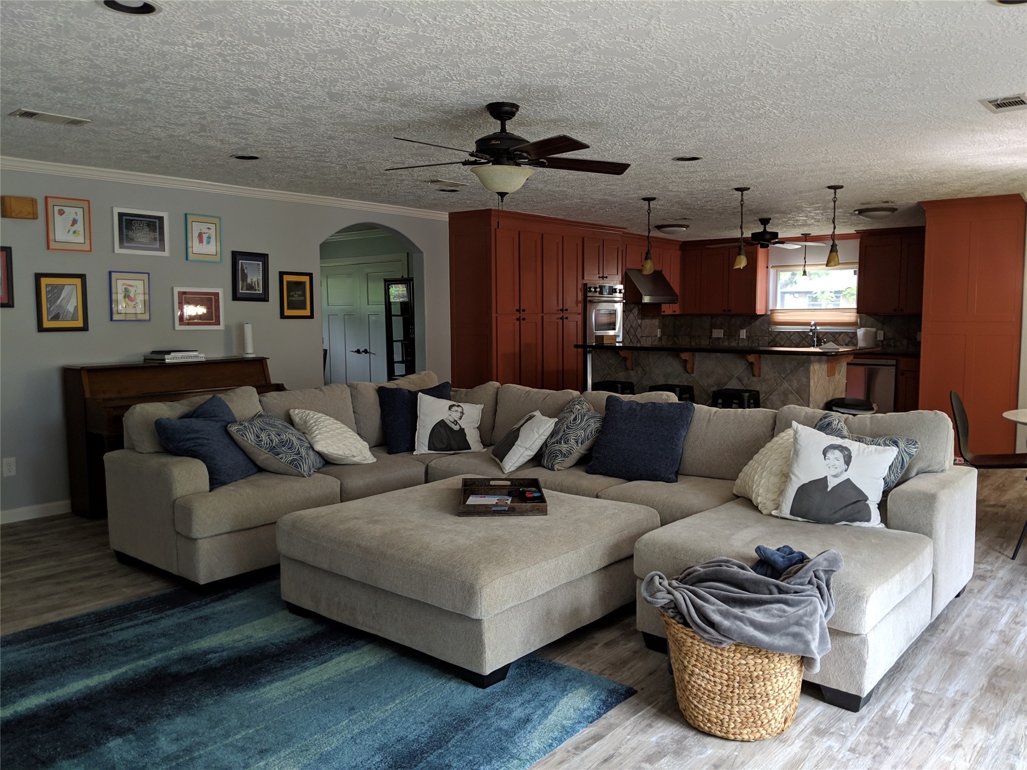 9614 Greenwillow Street Houston, TX 77096 - Photo 9 of 34 a living room with furniture and a chandelier