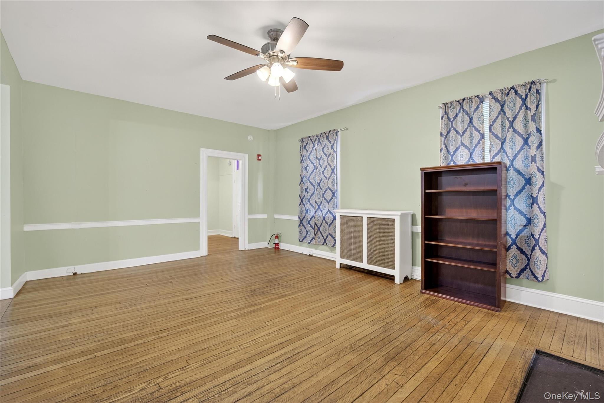 1 Angola Road Cornwall, NY 12518 - Photo 14 of 31 a view of an empty room with a window and a kitchen