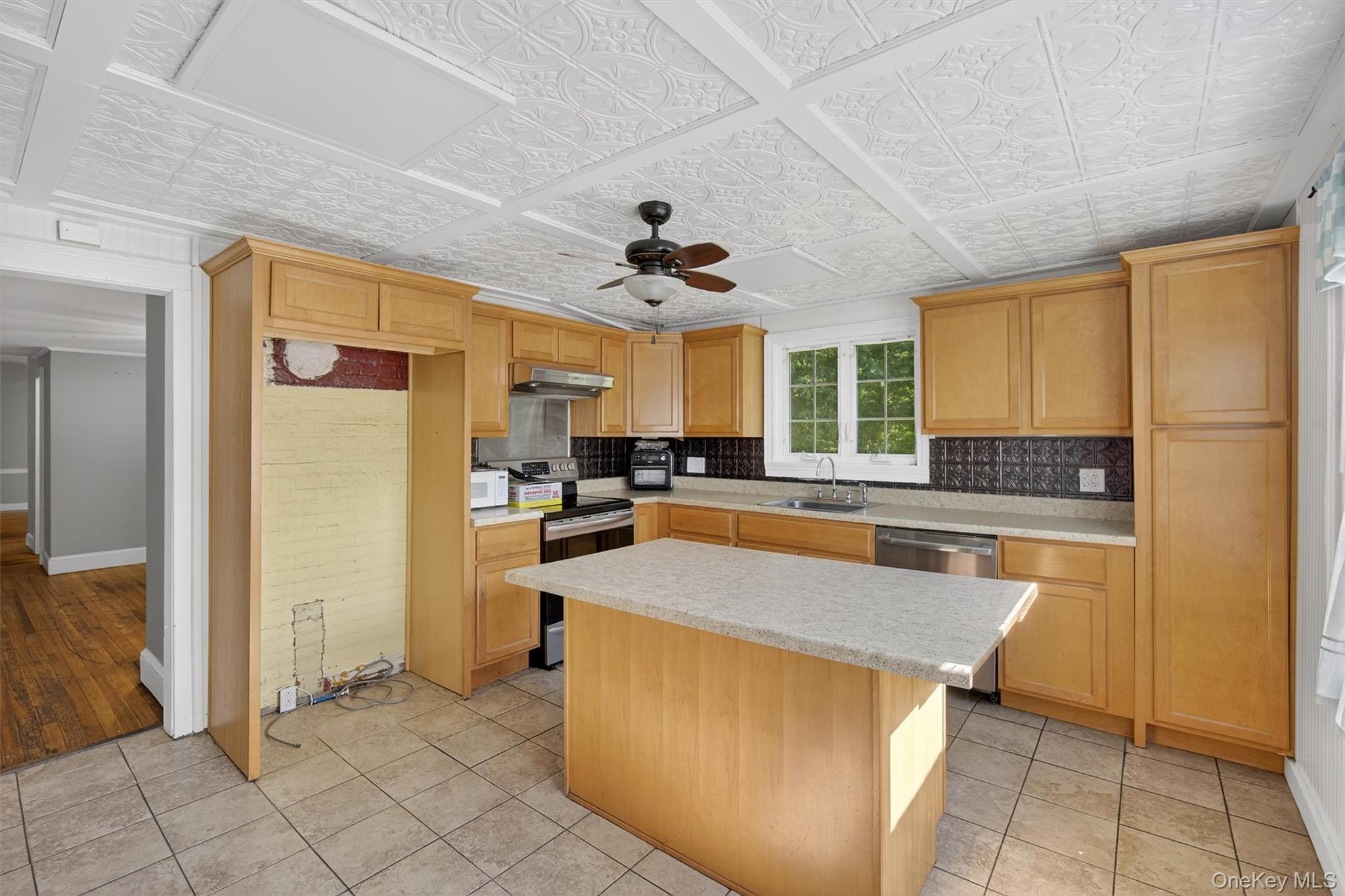 1 Angola Road Cornwall, NY 12518 - Photo 17 of 31 a view of a kitchen with kitchen island granite countertop a refrigerator and a sink