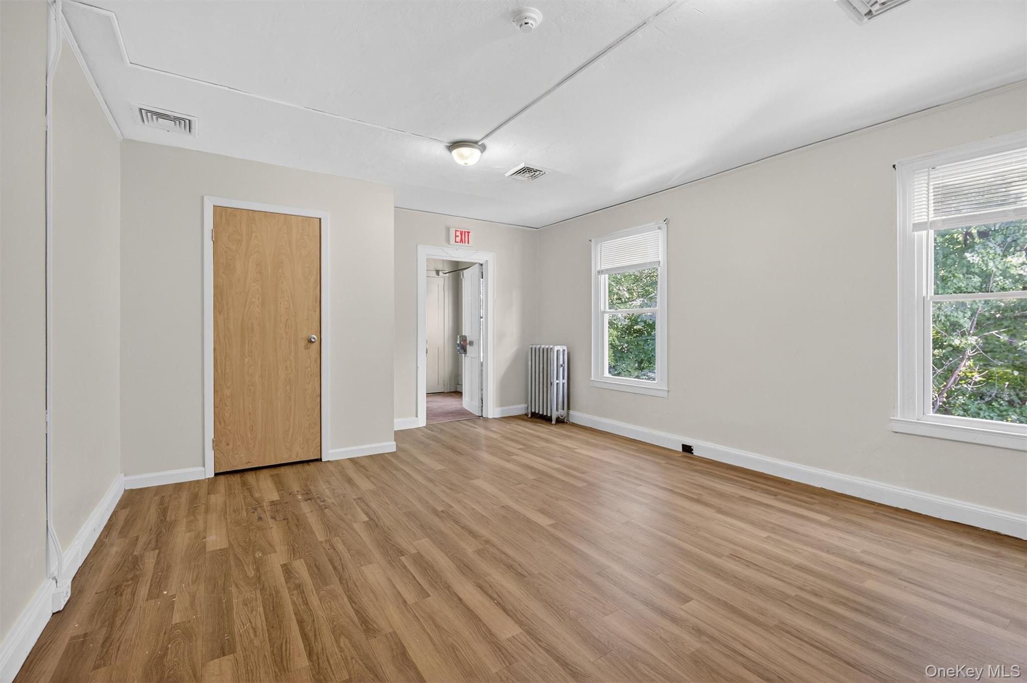 1 Angola Road Cornwall, NY 12518 - Photo 26 of 31 a view of an empty room with wooden floor and a window