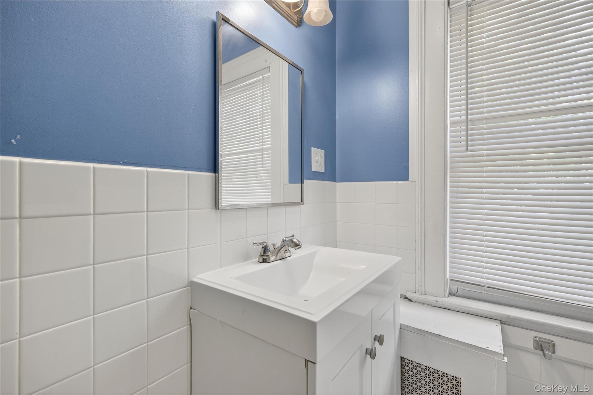 1 Angola Road Cornwall, NY 12518 - Photo 28 of 31 a bathroom with a sink and a mirror
