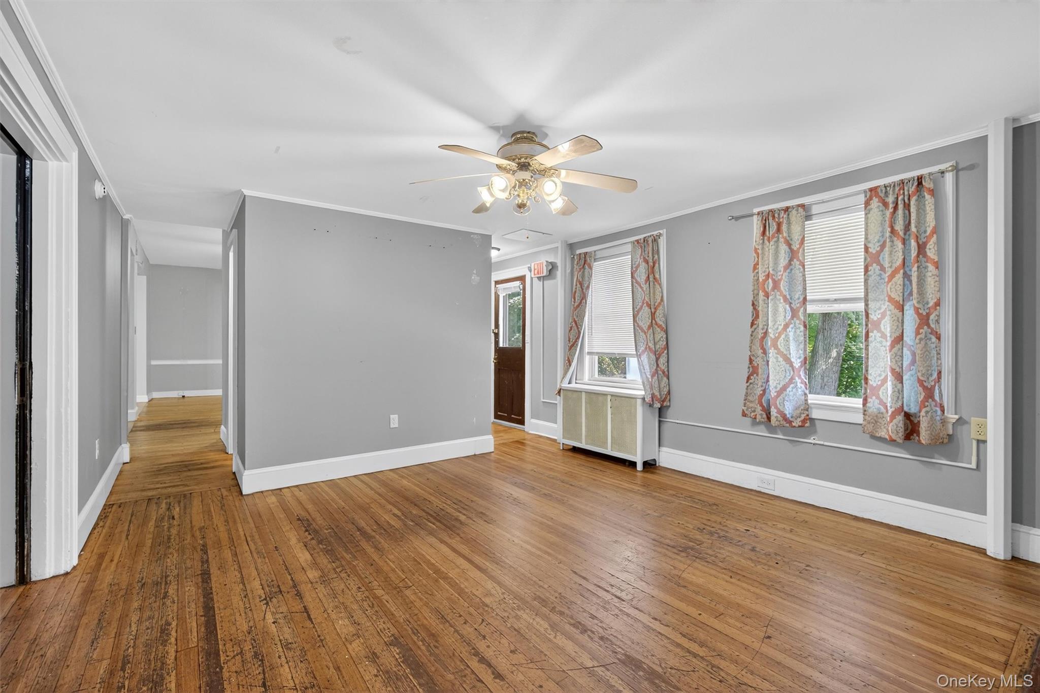 1 Angola Road Cornwall, NY 12518 - Photo 6 of 31 a view of an empty room with wooden floor and a window