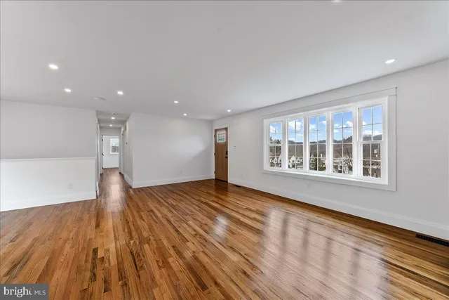 a view of a backyard with wooden floor