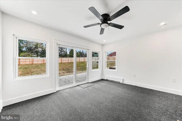 a view of an empty room and window