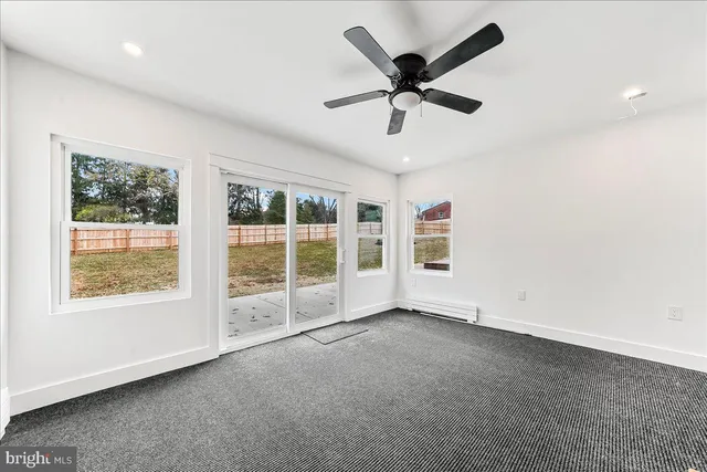 a view of an empty room and window
