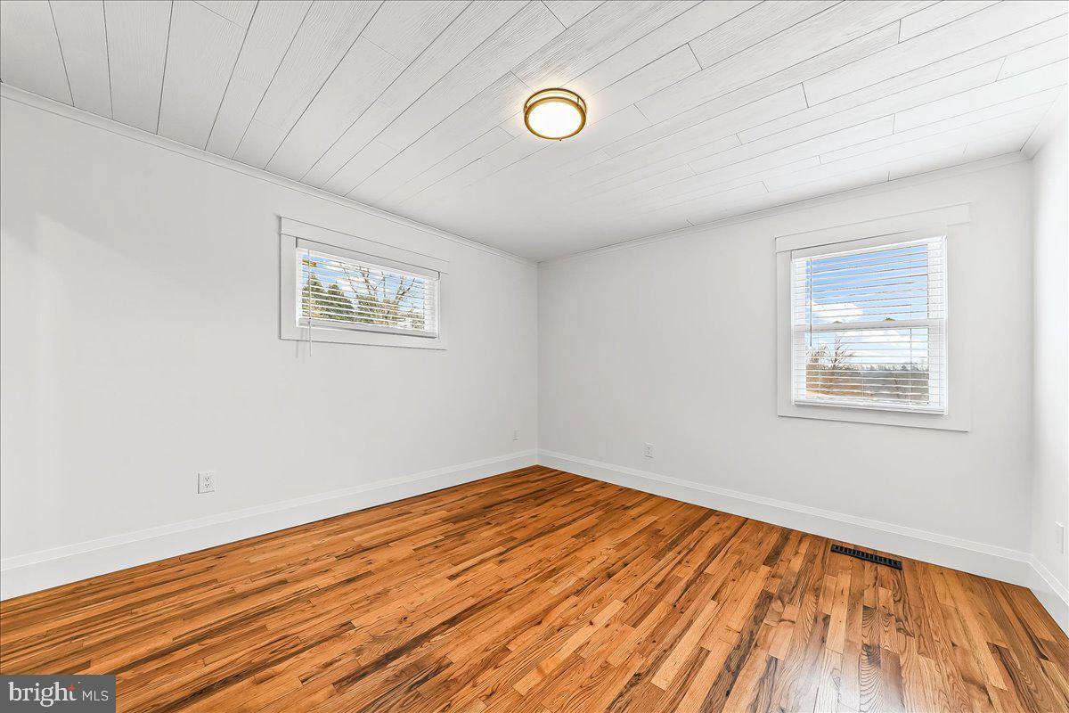 919 South Concord Road West Chester, PA 19382 - Photo 21 of 31 a view of empty room with wooden floor