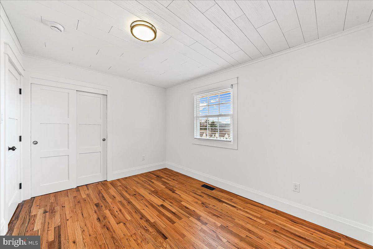 919 South Concord Road West Chester, PA 19382 - Photo 23 of 31 a view of a room with wooden floor and window