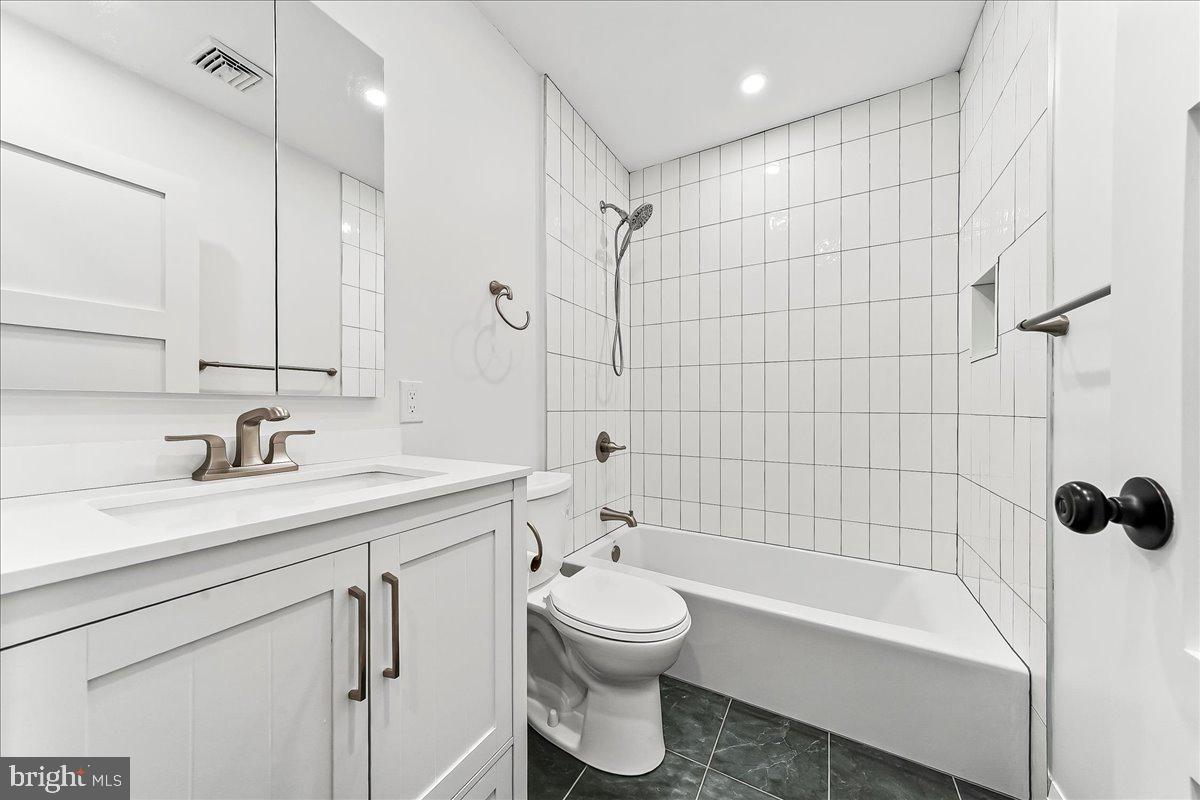 919 South Concord Road West Chester, PA 19382 - Photo 25 of 31 a bathroom with a sink toilet tub and shower