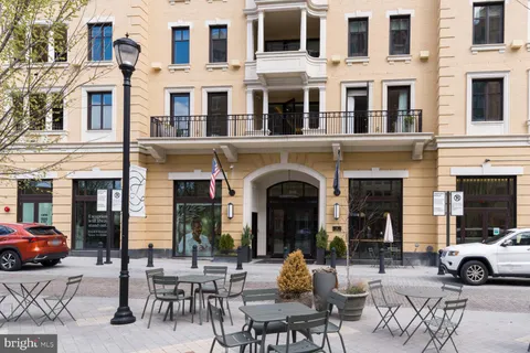 a view of a brick building with many windows