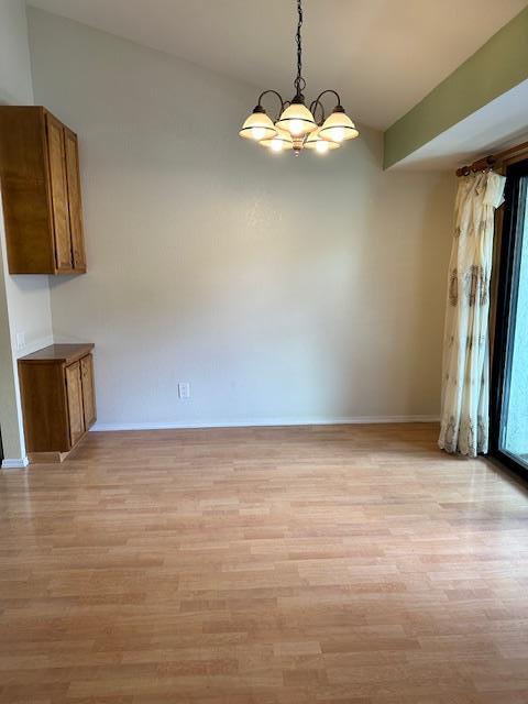 362 Kenbrook Circle San Jose, CA 95111 - Photo 18 of 19 a view of an empty room with wooden floor and a window