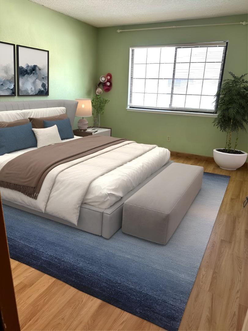 362 Kenbrook Circle San Jose, CA 95111 - Photo 4 of 19 a bedroom with a bed and a large window