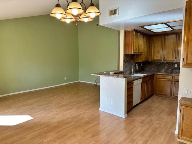 362 Kenbrook Circle San Jose, CA 95111 - Photo 6 of 19 a kitchen with a sink cabinets and a wooden floor
