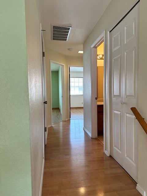 362 Kenbrook Circle San Jose, CA 95111 - Photo 8 of 19 a view of a hallway with wooden floor