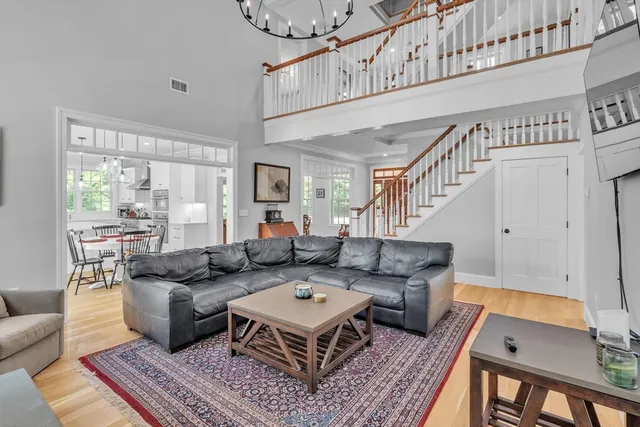 a living room with furniture and a table