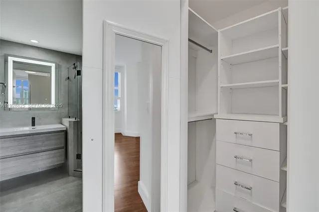 a view of a patio with couches and a fire pit