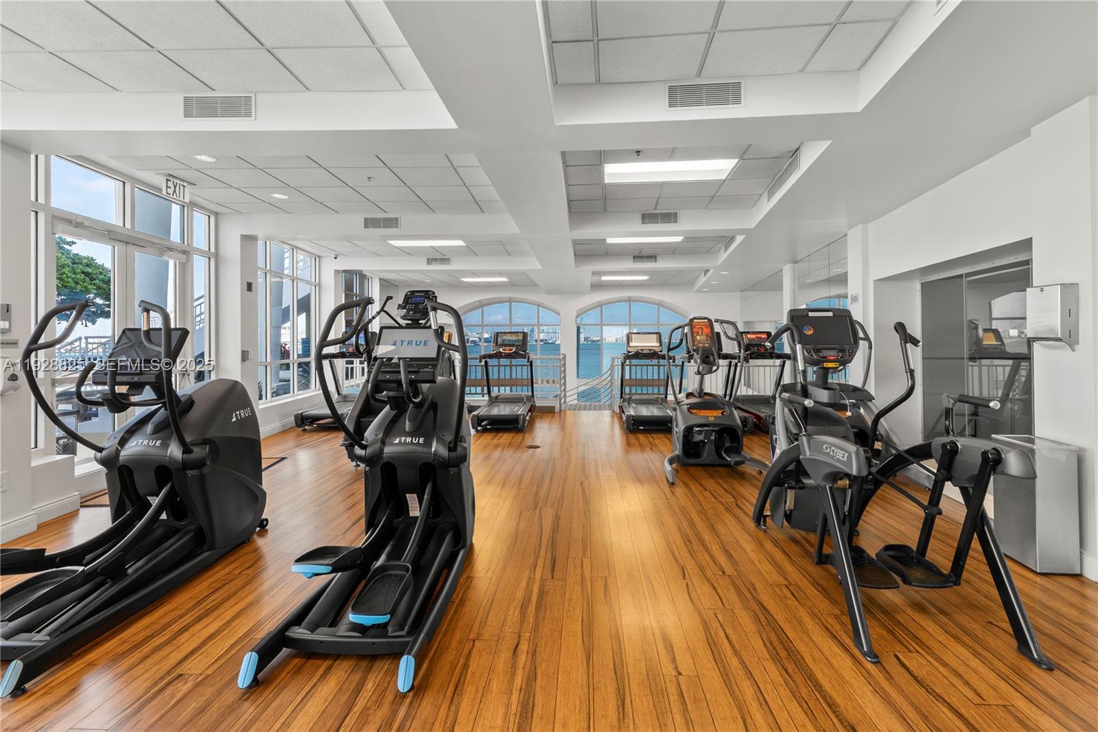 848 Brickell Key Drive, Unit 3206 Miami, FL 33131 - Photo 67 of 93 a view of a room with gym equipment