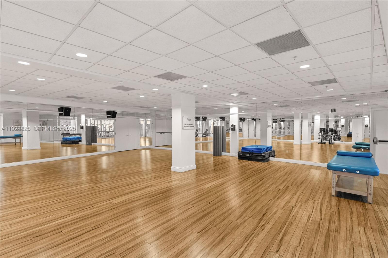 848 Brickell Key Drive, Unit 3206 Miami, FL 33131 - Photo 78 of 93 a view of a living room and kitchen with stainless steel appliances granite countertop a couch and a living room view