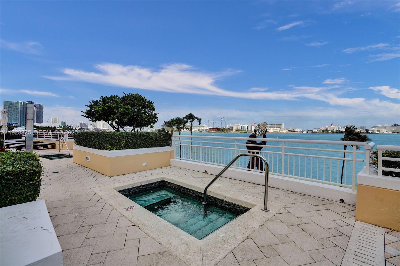 848 Brickell Key Drive, Unit 3206 Miami, FL 33131 - Photo 86 of 93 a view of a terrace with chairs