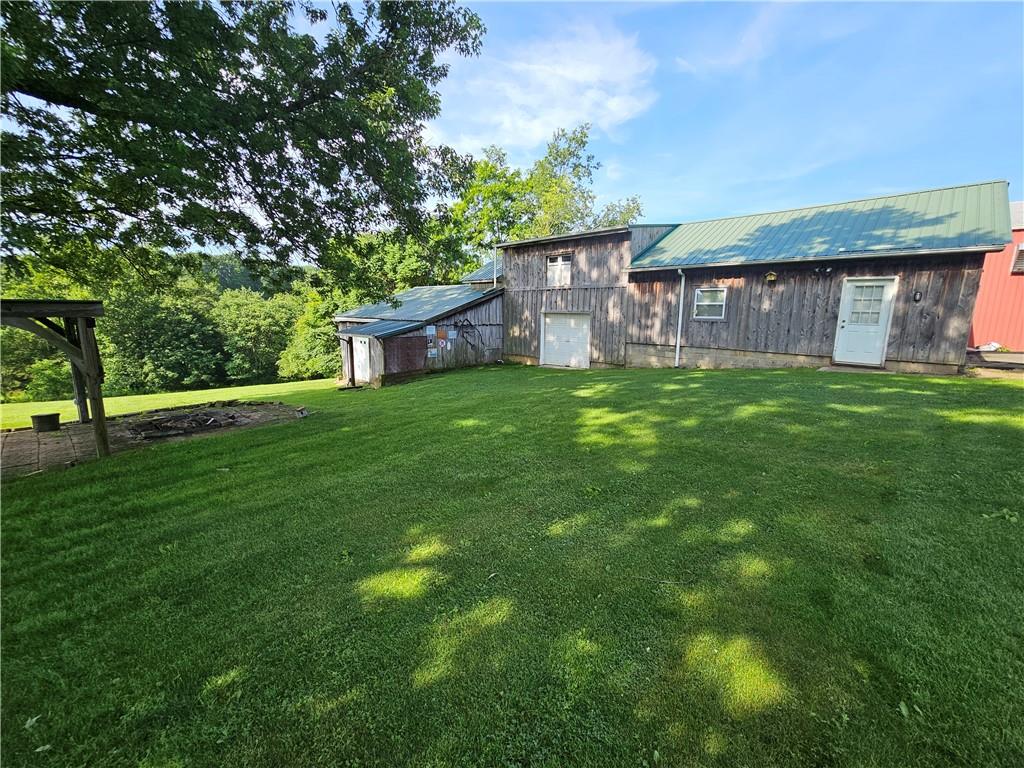 342 Concord Church Road Beaver Falls, PA 15010 - Photo 13 of 44 a backyard of a house with lots of green space